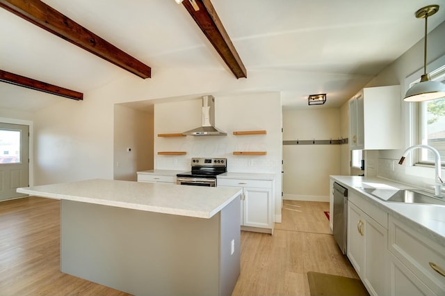 kitchen featuring a sink, open shelves, appliances with stainless steel finishes, wall chimney exhaust hood, and decorative backsplash