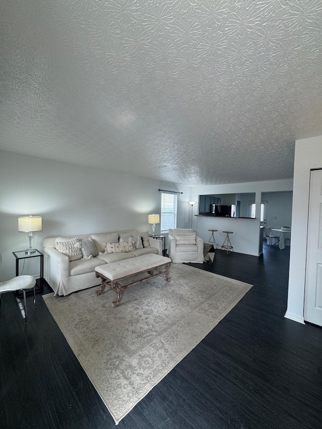 unfurnished living room featuring wood finished floors