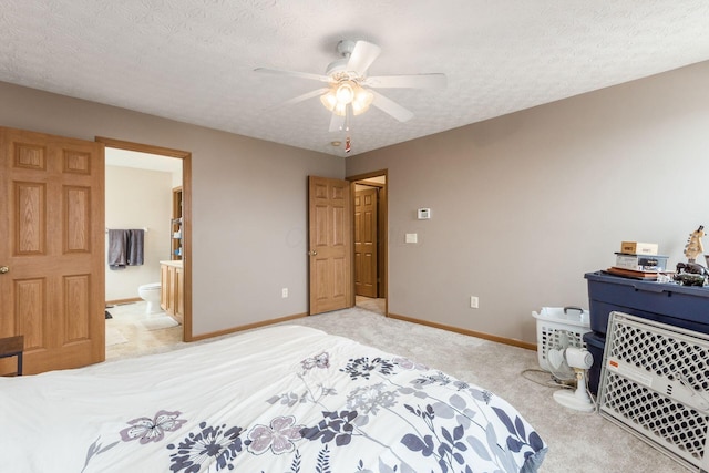 bedroom with light carpet, a ceiling fan, baseboards, and a textured ceiling