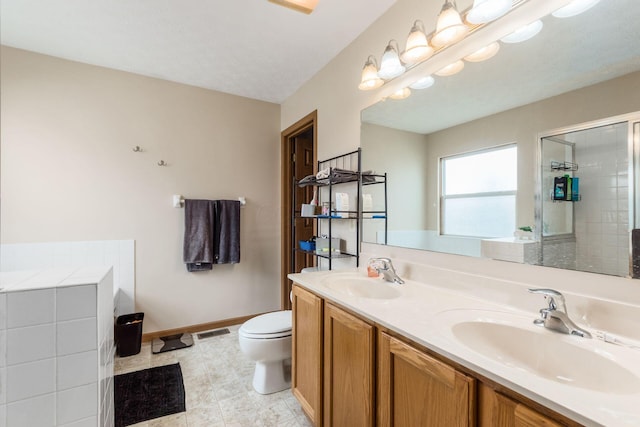 full bath featuring toilet, a stall shower, a sink, and visible vents