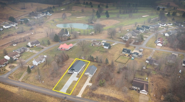 bird's eye view with a rural view and a water view