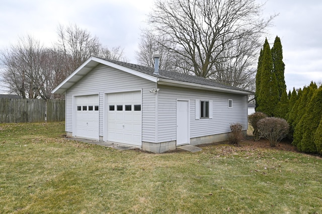 detached garage with fence