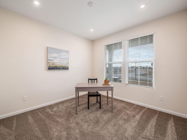 carpeted office space with baseboards and recessed lighting