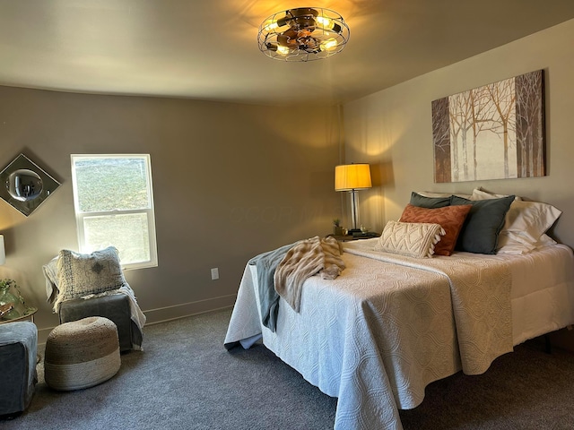 carpeted bedroom with baseboards