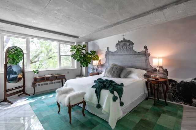 bedroom featuring radiator heating unit