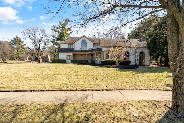 view of front of home with a front lawn