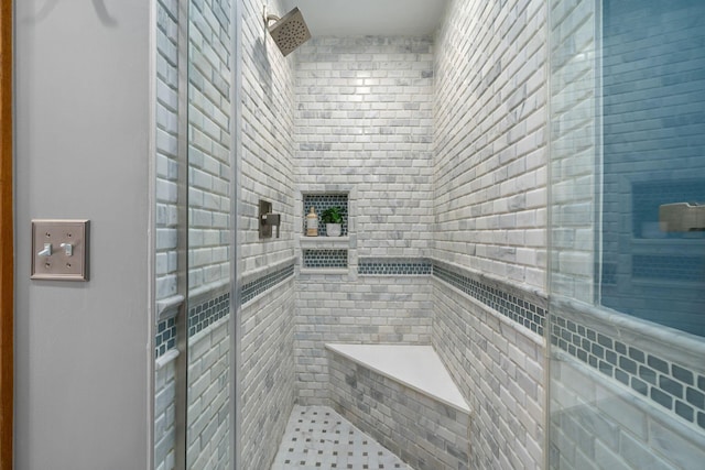 full bath featuring a shower stall