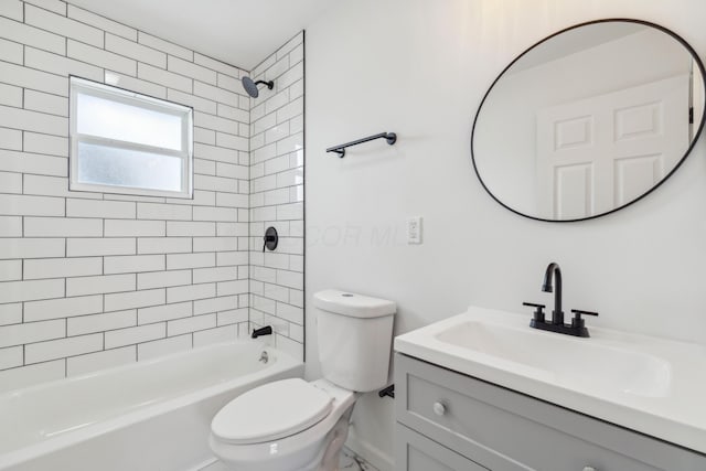 bathroom with shower / bath combination, vanity, and toilet