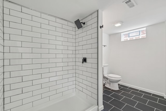 full bathroom with tile patterned flooring, toilet, visible vents, baseboards, and a stall shower