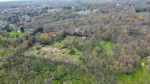 aerial view with a wooded view