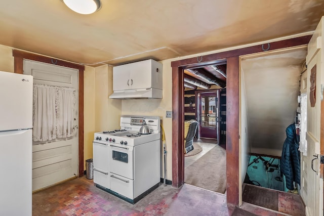 kitchen with under cabinet range hood, white appliances, and white cabinets