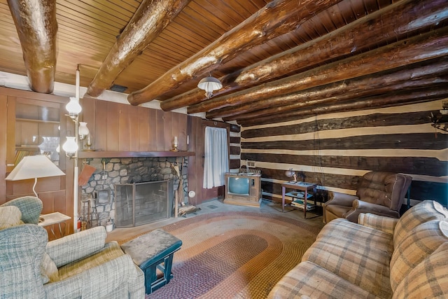 living room featuring beam ceiling, wood ceiling, wood walls, and a fireplace