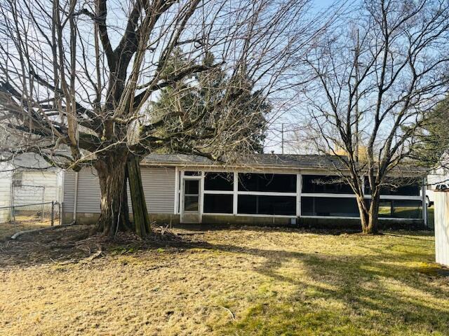 view of home's exterior featuring a yard