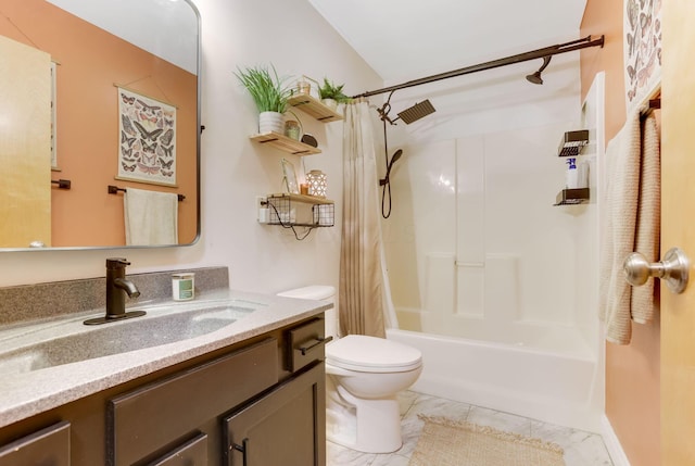 bathroom with toilet, marble finish floor, shower / bath combo, and vanity