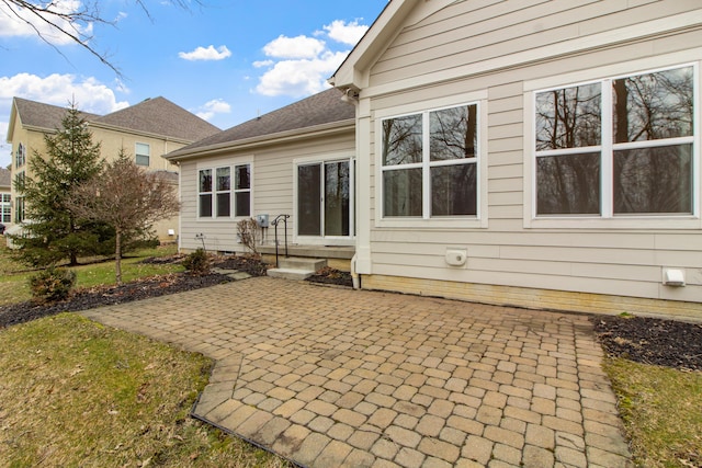 back of property with crawl space, a patio area, and entry steps