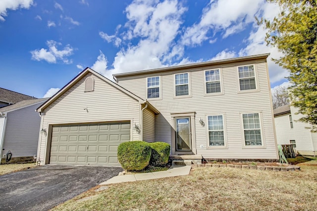 3093 Briar Ridge Rd, Columbus, OH 43232 - colonial house with aphalt driveway and an attached garage