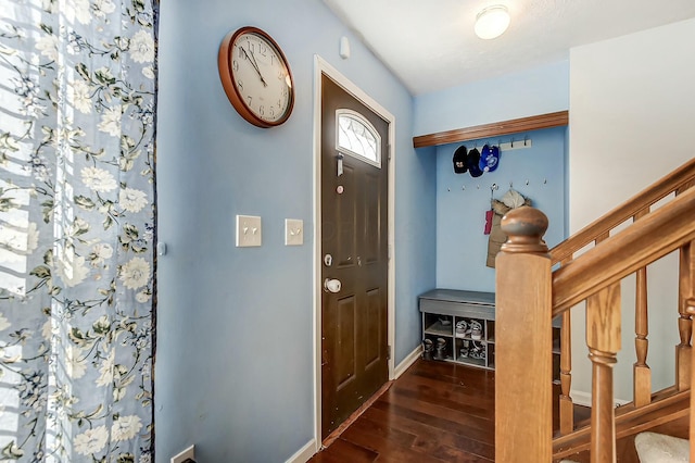 3093 Briar Ridge Rd, Columbus, OH 43232 - foyer entrance with wood finished floors, baseboards, and stairs