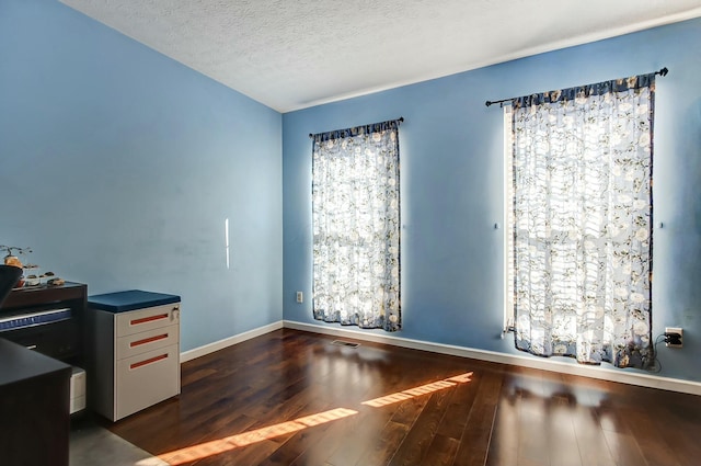 3093 Briar Ridge Rd, Columbus, OH 43232 - interior space featuring baseboards, dark wood finished floors, and a textured ceiling