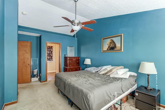 3093 Briar Ridge Rd, Columbus, OH 43232 - carpeted bedroom featuring lofted ceiling, ceiling fan, a textured ceiling, and baseboards