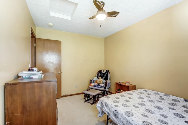 3093 Briar Ridge Rd, Columbus, OH 43232 - carpeted bedroom with a skylight, a ceiling fan, and baseboards