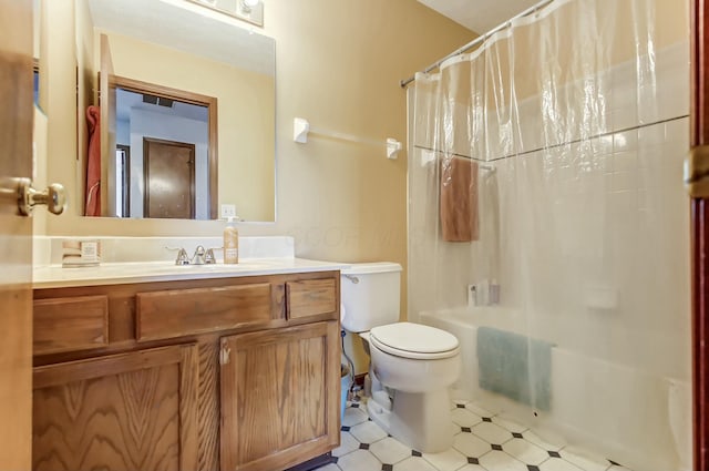 3093 Briar Ridge Rd, Columbus, OH 43232 - bathroom with toilet, vanity, shower / tub combo with curtain, and tile patterned floors