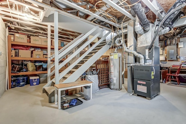 3093 Briar Ridge Rd, Columbus, OH 43232 - unfinished below grade area with gas water heater, electric panel, stairway, and heating unit