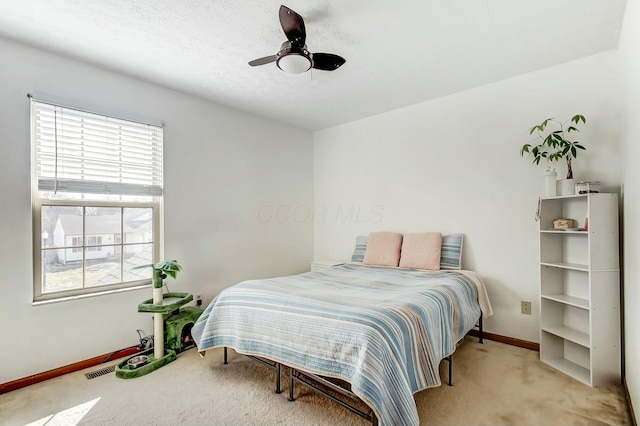 3093 Briar Ridge Rd, Columbus, OH 43232 - bedroom featuring light carpet, baseboards, and a ceiling fan