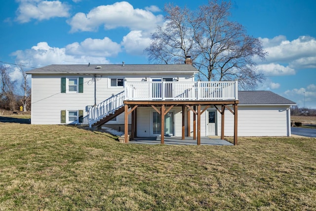 rear view of house featuring a yard, a patio, a chimney, a wooden deck, and stairs