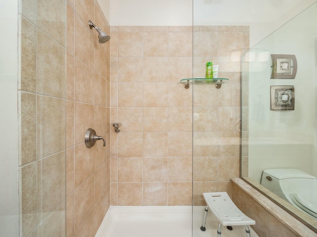 full bath featuring tiled shower