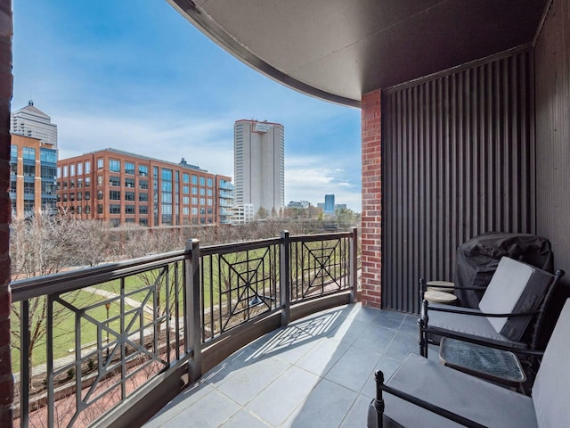 balcony featuring a city view