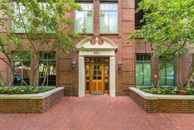 entrance to property with french doors and brick siding