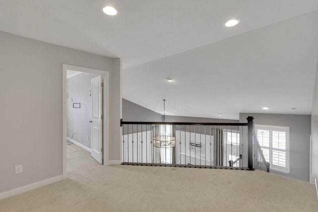 hall featuring carpet floors, baseboards, and recessed lighting