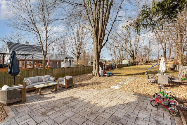 view of patio with a fenced backyard and an outdoor living space