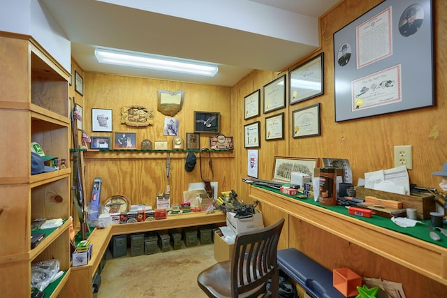 miscellaneous room with unfinished concrete flooring