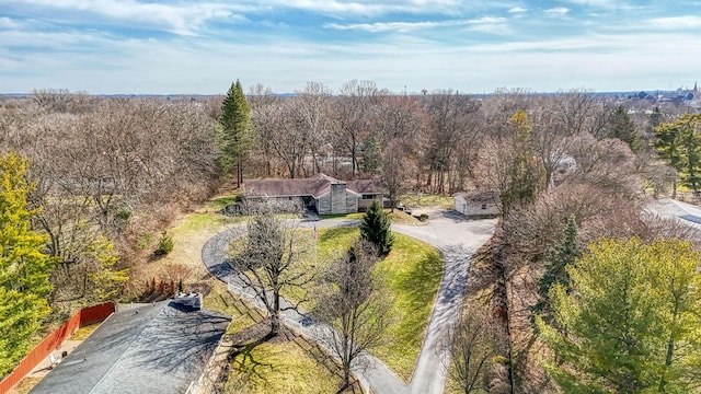aerial view with a wooded view