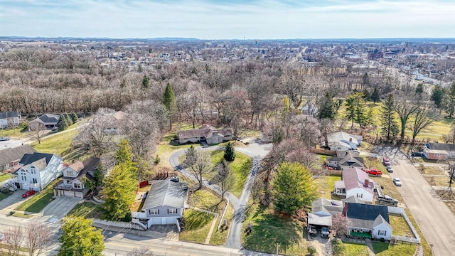 birds eye view of property with a residential view