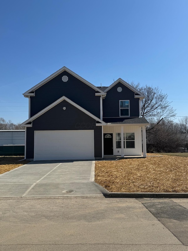 view of front facade featuring driveway and a garage