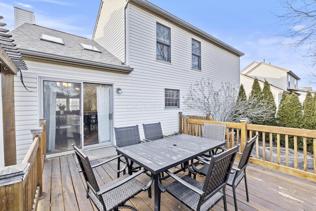 deck with outdoor dining space