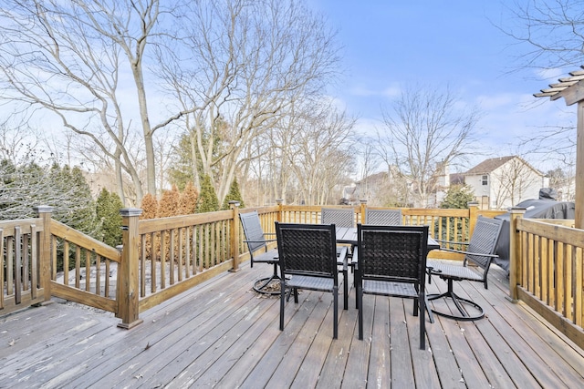 deck featuring outdoor dining area