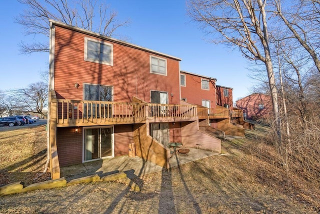 rear view of property with a deck