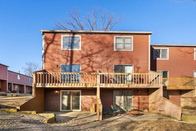 rear view of property with a patio area