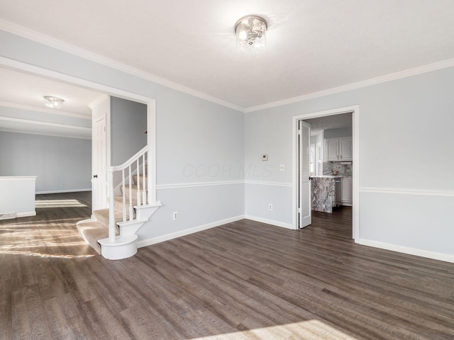 unfurnished room with dark wood-style flooring, baseboards, and stairs