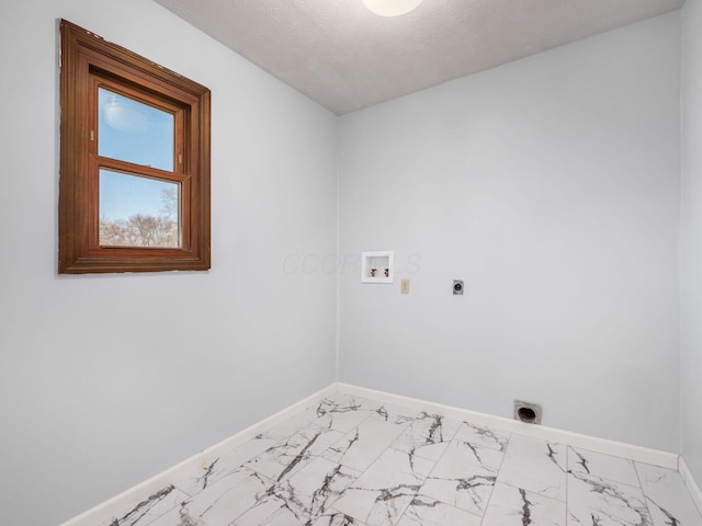 washroom with laundry area, baseboards, marble finish floor, hookup for an electric dryer, and washer hookup