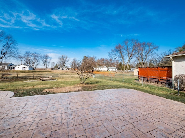 view of patio / terrace featuring fence