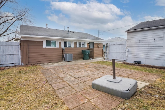 back of property featuring a patio, cooling unit, and fence