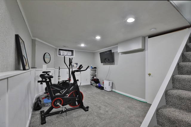 workout room with recessed lighting, carpet flooring, crown molding, and baseboards