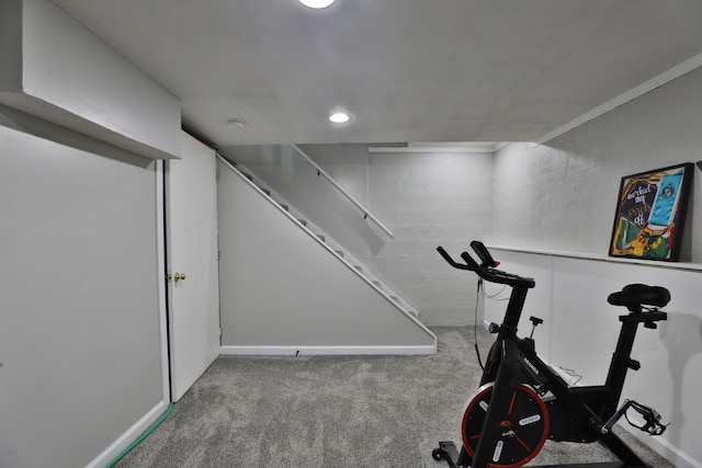 workout room with carpet floors and baseboards