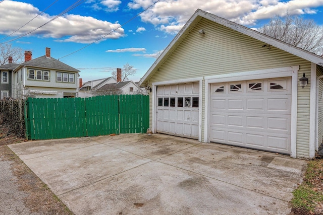 detached garage with fence