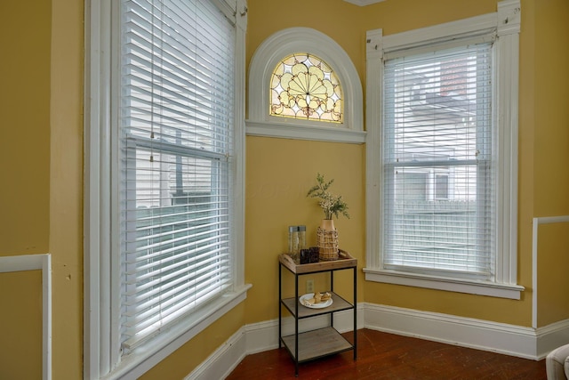 details with wood finished floors and baseboards