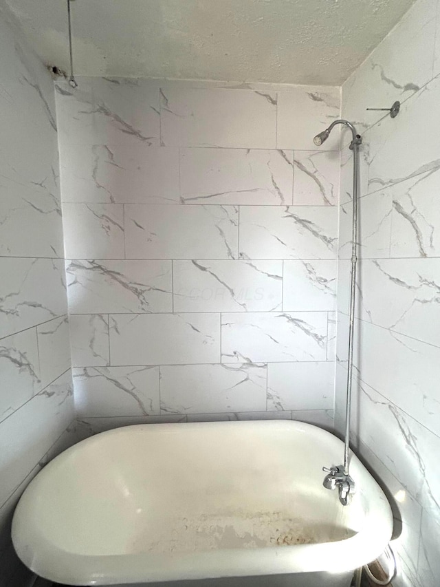 full bathroom featuring a soaking tub and walk in shower